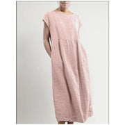 Solid color sleeveless loose cotton and linen pocket dress